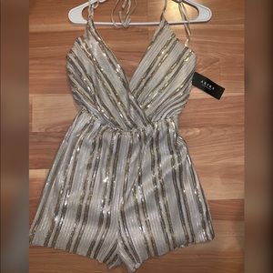 Sequin romper. Never worn! Tag still on!